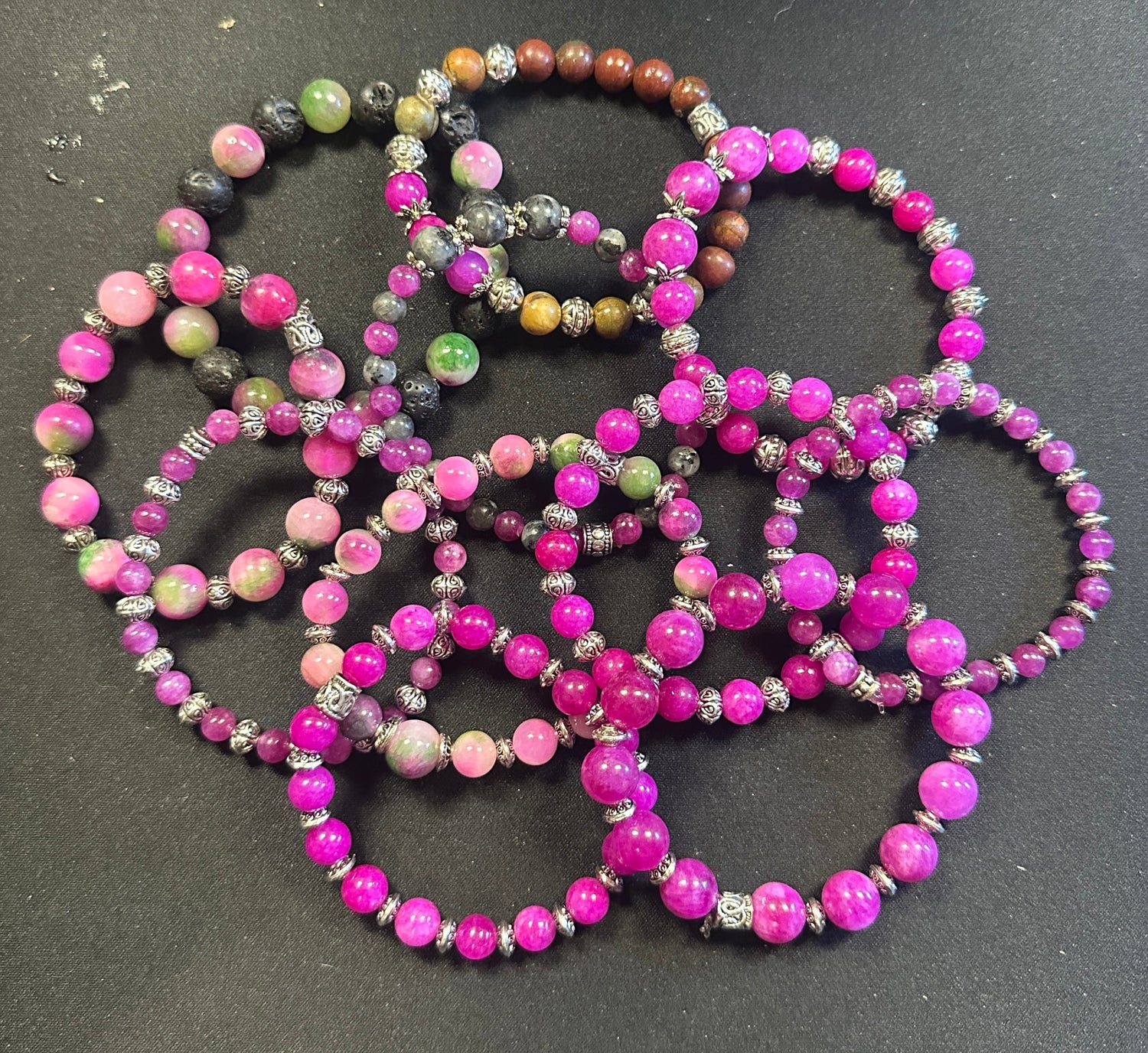 Pile of Pink Gemstone Bracelets