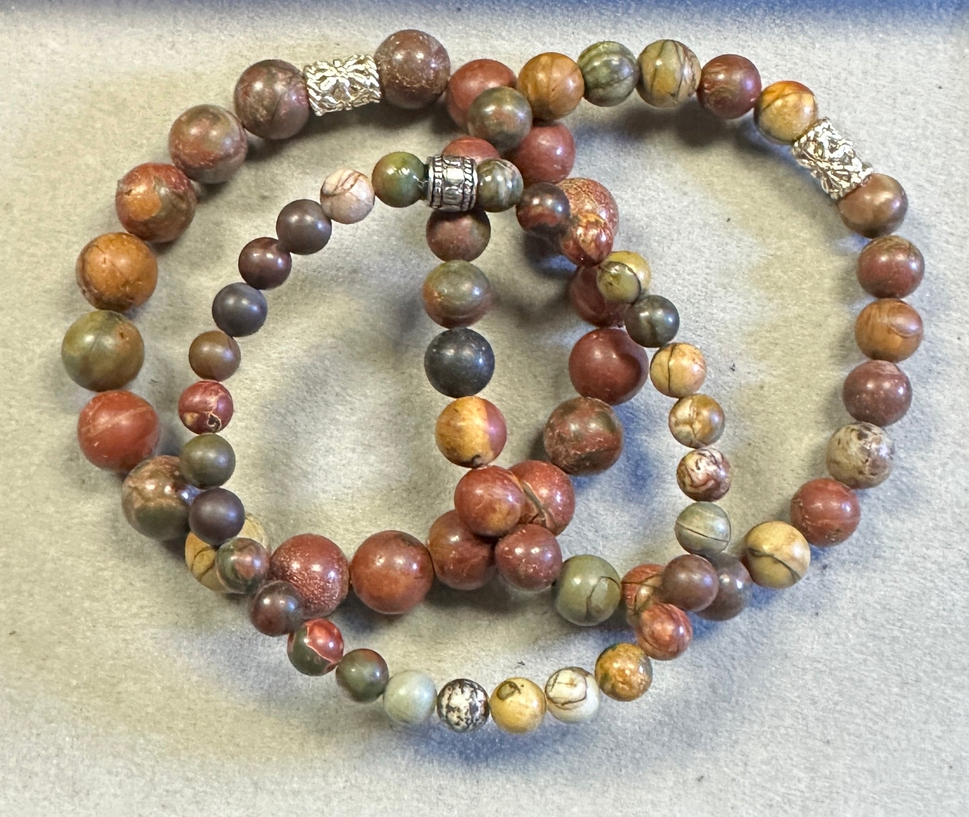 Multicolored beaded bracelet on a textured surface